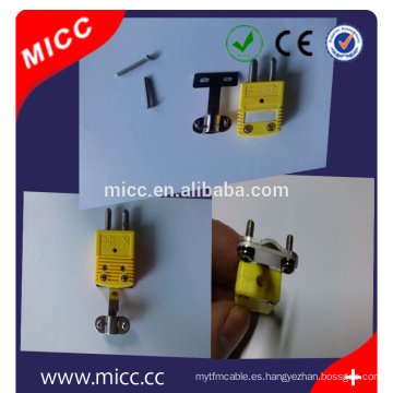 Conector estándar omega de color amarillo MICC con abrazadera